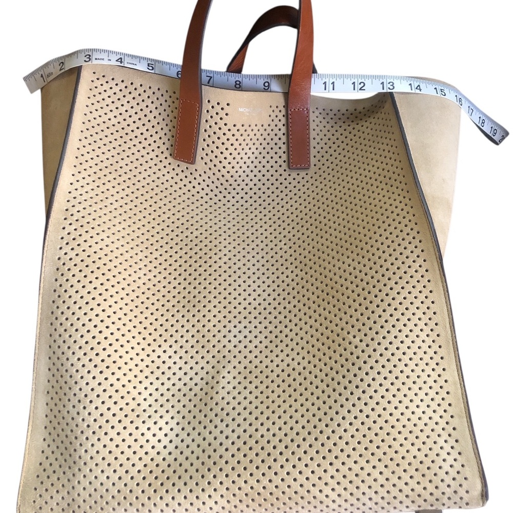 Michael Kors Perforated Tote in Tan and Brown Leather. Good/great condition. - Picture 16 of 16